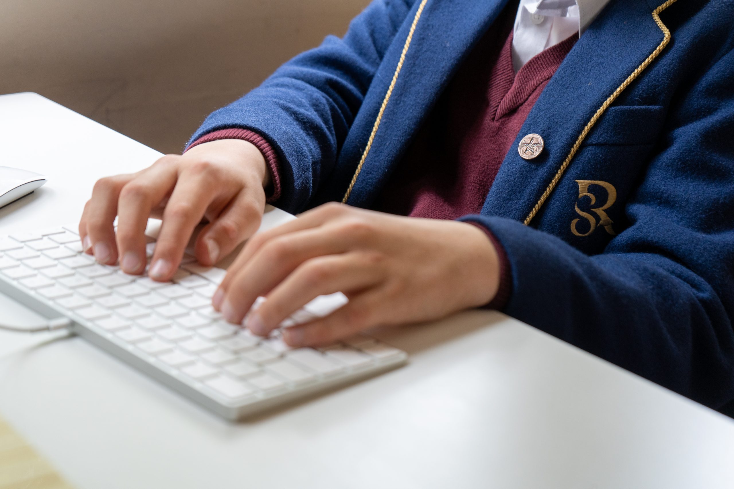 Rookwood Private School student typing on a computer keyboard