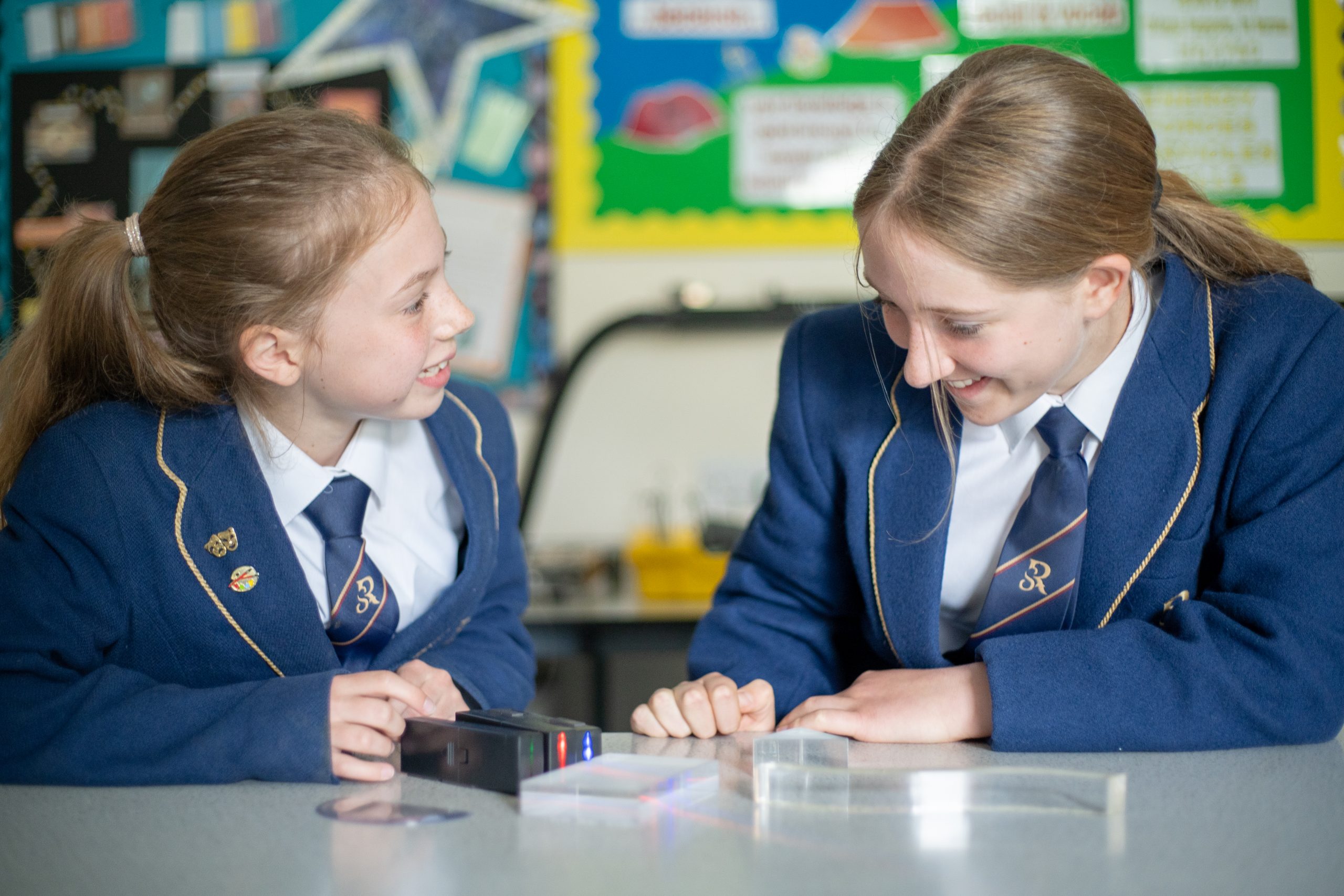 Rookwood School students laughing while completing a task in class