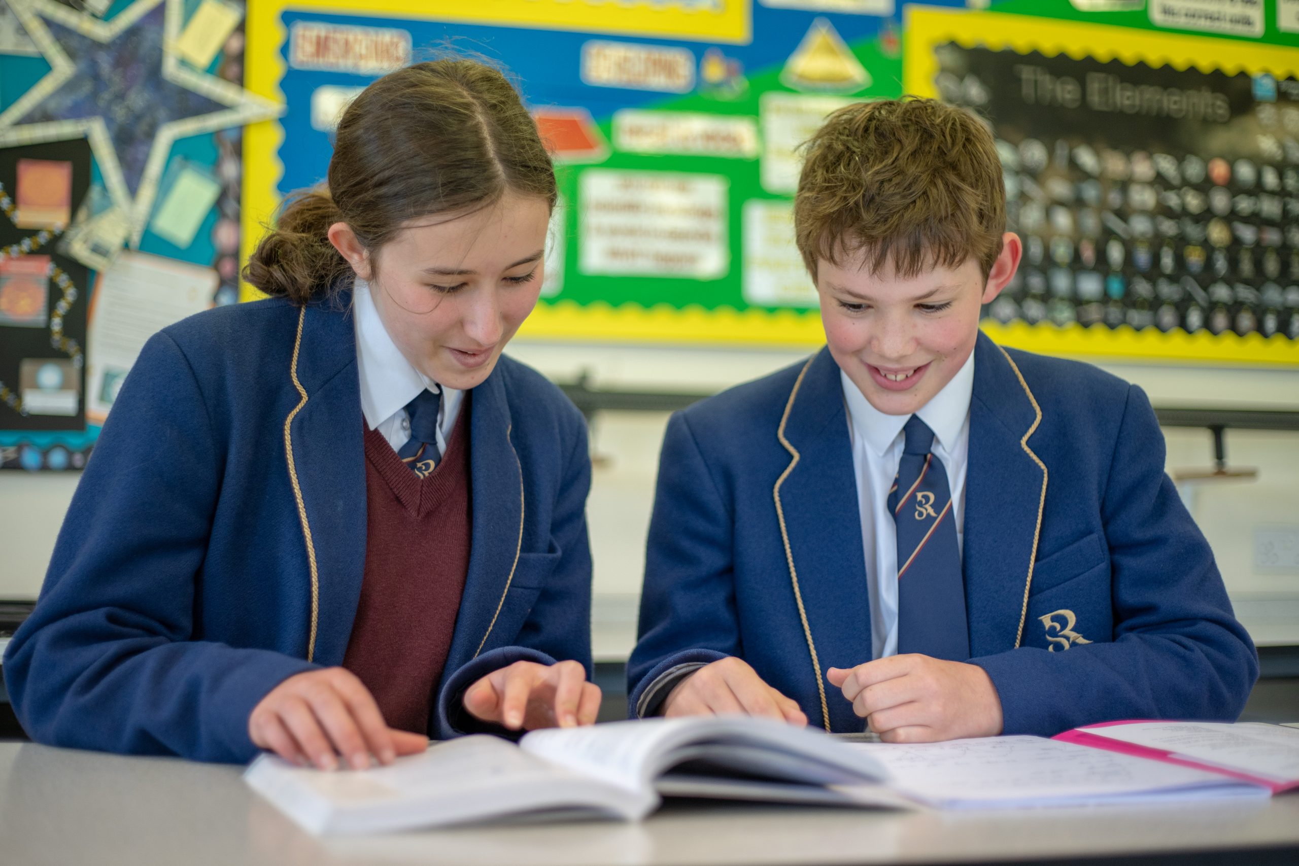 Rookwood private school students reading a book in class