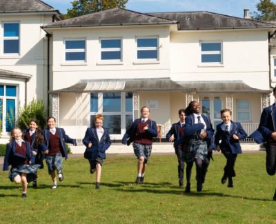 Rookwood private school students running on grass